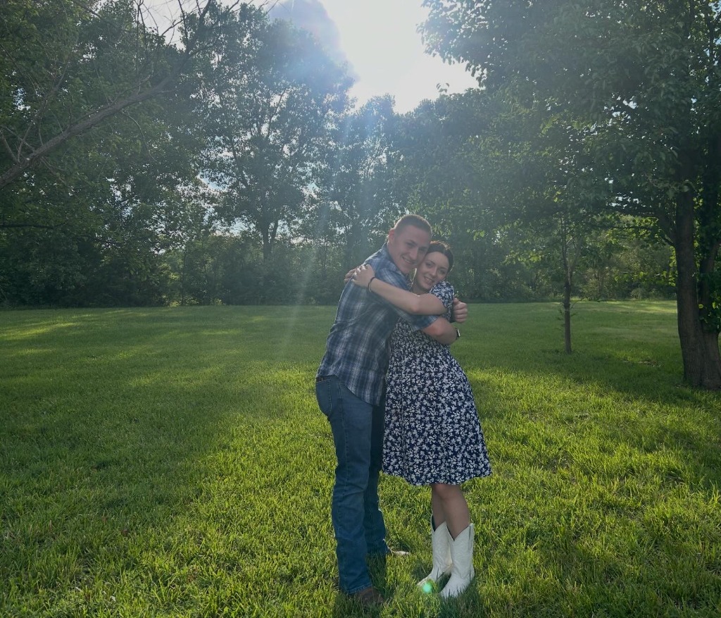 Hannah and Jim Henry in the field